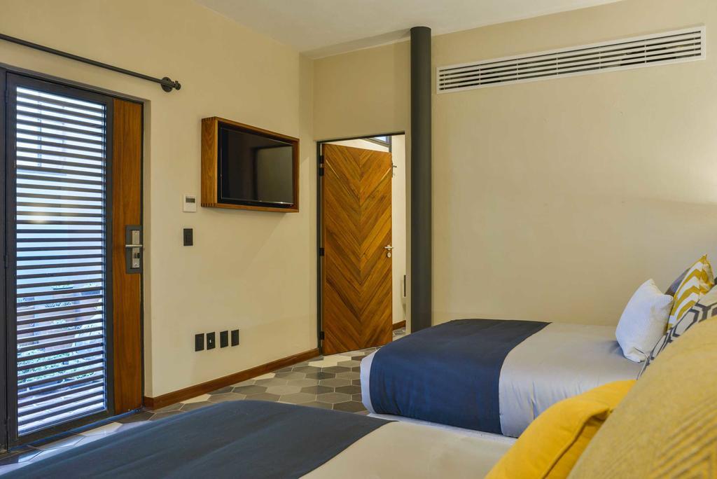 Hotel Criol Керетаро Екстер'єр фото A room at the hotel